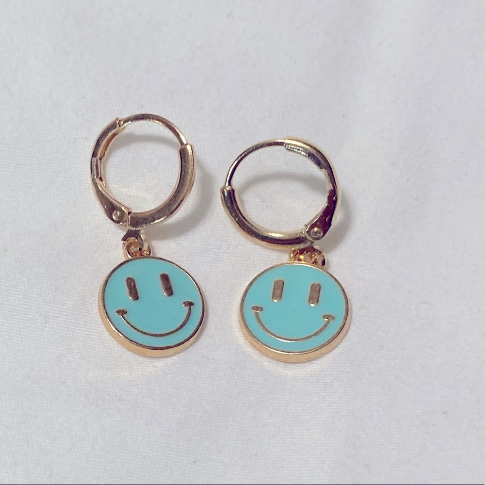Light blue smiley face earrings